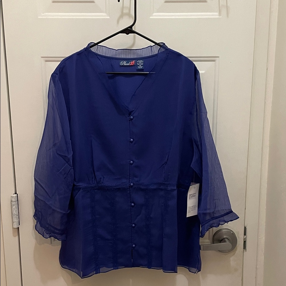 NWT: Women’s Size 3X Indigo Blue blouse 3/4 sleeve lined 100% polyester.